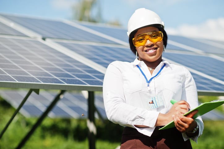 African American large scale solar technician