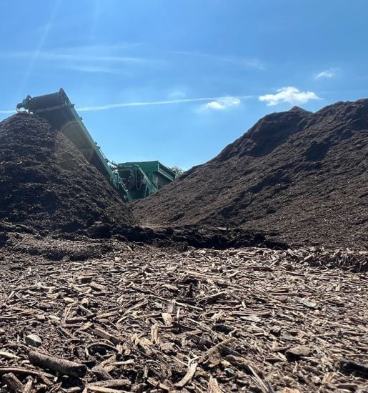 machinery moving compost
